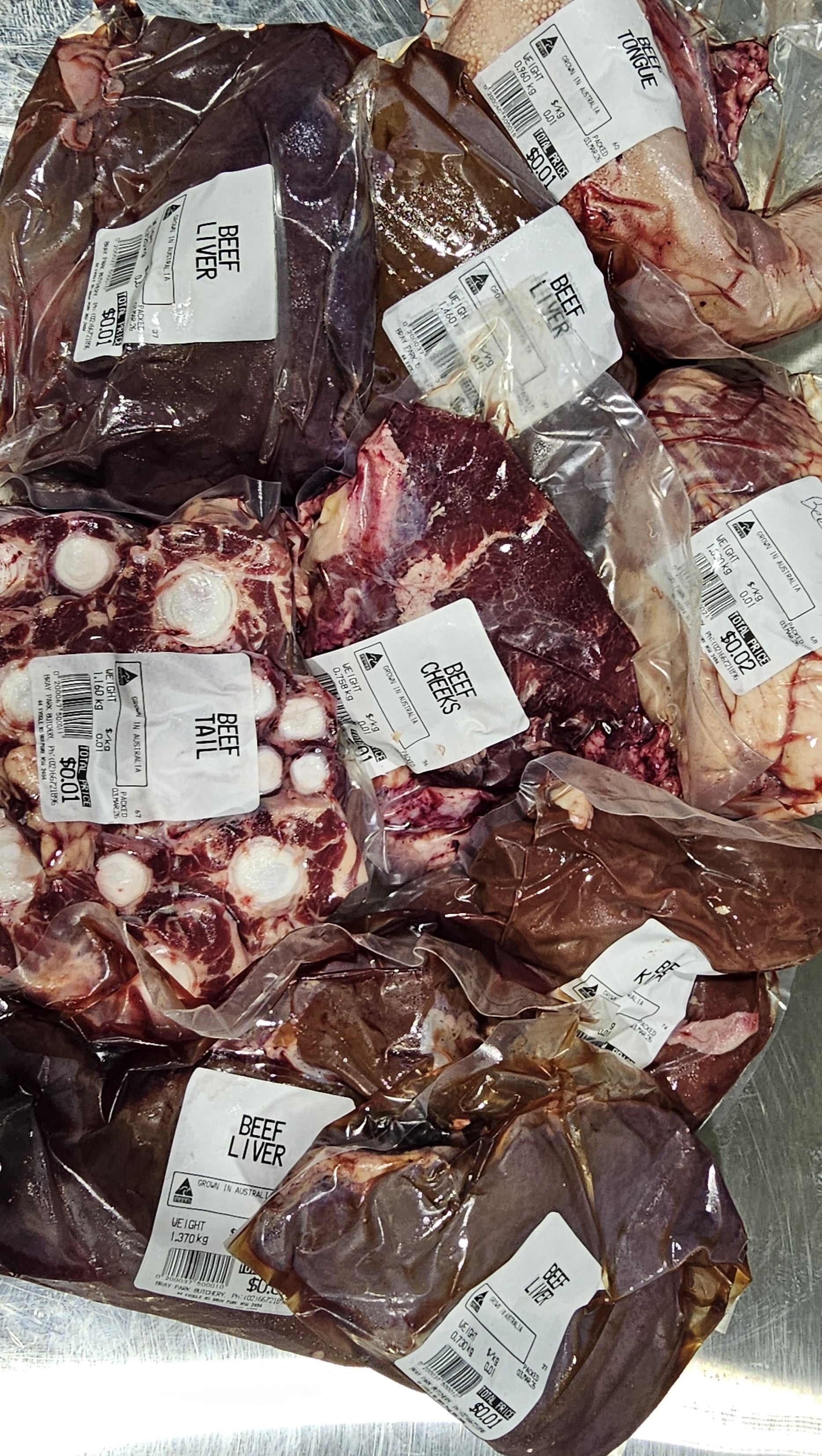 9 kg mixed assortment of offal, portioned and cryovaced for human consumption.